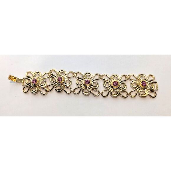 Abstract Gold Tone Flower Bracelet with Pink Center Stone Avon - Picture 3 of 11
